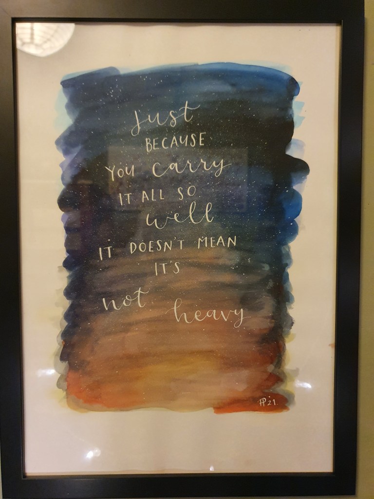 A picture reading "just because you carry it so well it doesn't mean it's not heavy"